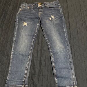 Dkin Ripped Jeans. Embroidered in the back pockets.